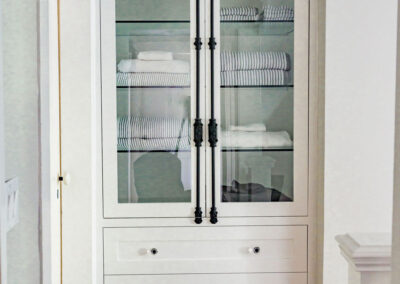 custom white and glass cabinet work - new canaan ct